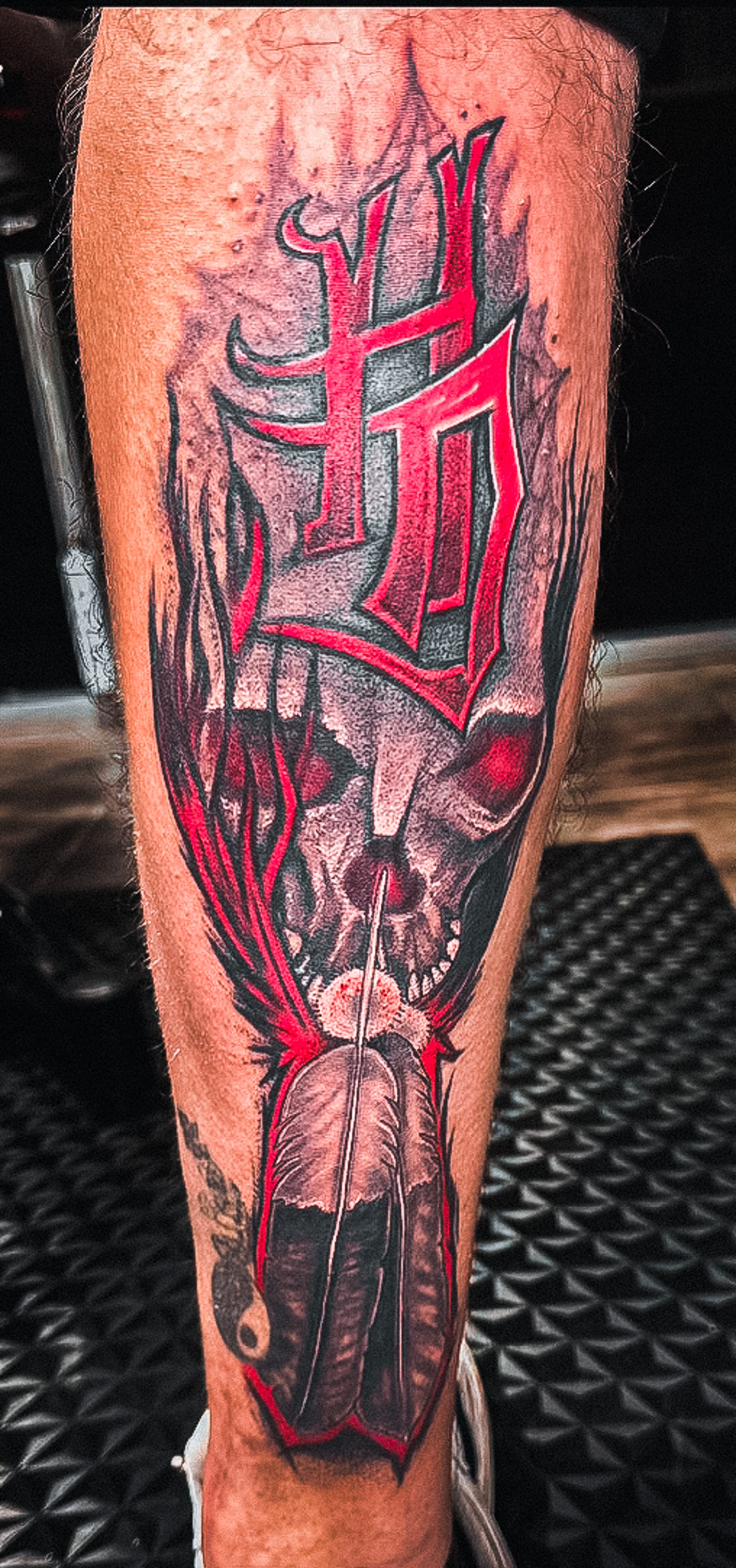 custom flaming skull tattoo by Eric Coe at Eternal Souls Tattoo Studio in Denton Texas